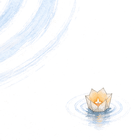 One paper lantern alone on open water, with a small ripple of its own.